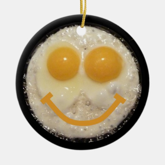 Twee eieren in een ventilatorpan met glimlach keramisch ornament (Voorkant)