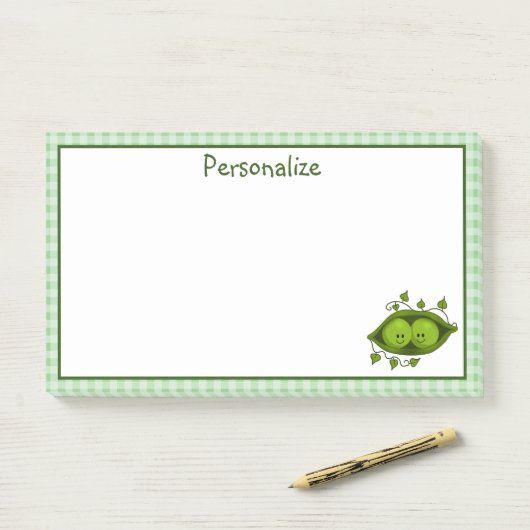 Twee erwten in een peul post-it® notes (Op bureau)