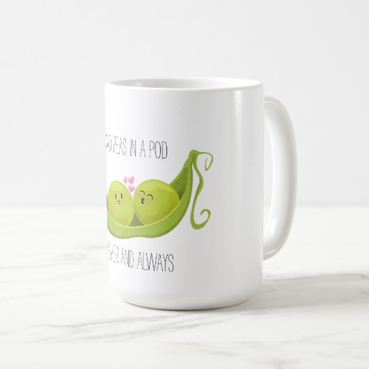 Twee erwten in een peuterkoffie-mok koffiemok (Voorkant rechts)