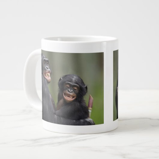 Twee glimlende bonobo's grote koffiekop (Links)