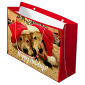 Twee Golden Retriever-honden in Kerstmis in Santa Groot Cadeauzakje (Voorkant Gekanteld)