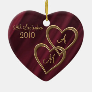 Twee gouden harten verweven keramisch ornament