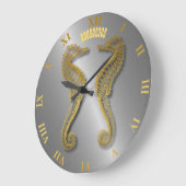 Twee gouden zeepaardjes 3d met schaduwen grote klok (Hoek)