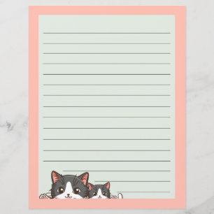 Twee grijze kittens op papier