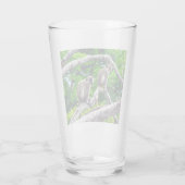 Twee groene apen die in een boomglas zitten glas (Achterkant)