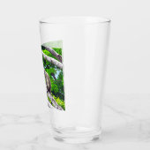 Twee groene apen die in een boomglas zitten glas (Links)