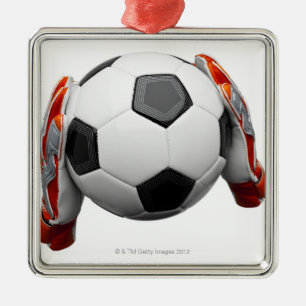 Twee handschoenen met een football metalen ornament