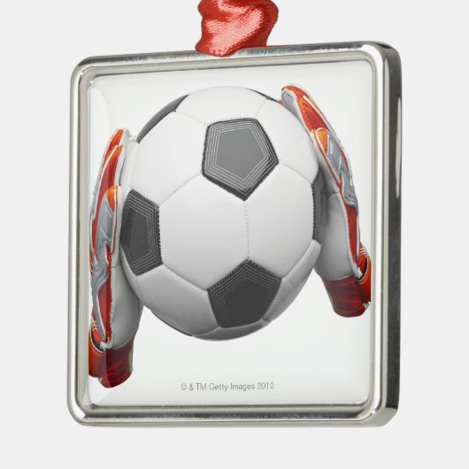 Twee handschoenen met een football metalen ornament (Links)