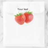 Twee hartvormige aardbeien ronde sticker (Tas)