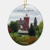 Twee havenvuurtoren en bootversiering keramisch ornament (Links)