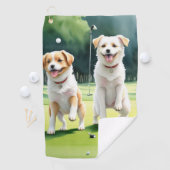 Twee honden die golfhanddoek spelen (Insitu)