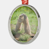 twee jonge marmos metalen ornament (Links)