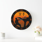 Twee karaatstrijders met stijgende zon grote klok (Huis)