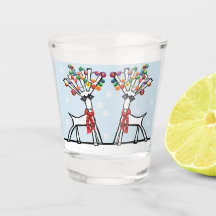 Twee kerstfeestrendieren met sneeuwvlokken