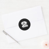 Twee kleine ronde zwarte stickers van Janz (Envelop)