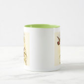 Twee kleurige Hummingvogels die op dezelfde bloem Mok (Midden)