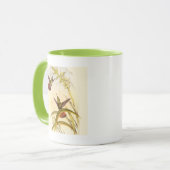 Twee kleurige Hummingvogels die op dezelfde bloem Mok (Voorkant links)