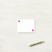 Twee leunende rode harten, post het notities post-it® notes (Op bureau)
