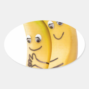 Twee liefdevolle bananen met ogen en mond ovale sticker