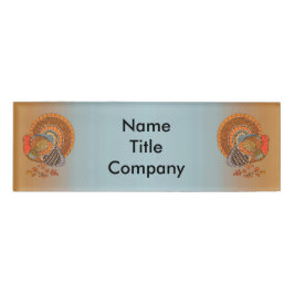 Twee majestueuze kalkoenen verlaten blauw Sinaasap Naambadge