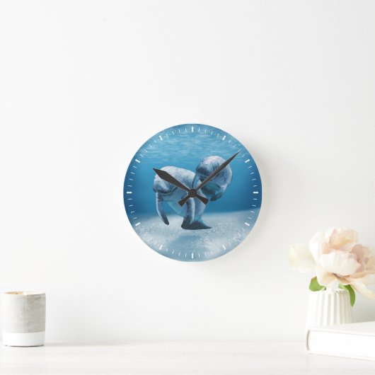 Twee Manatees die zwemmen Ronde Klok (Huis)