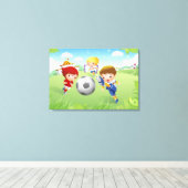 Twee meisjes en een jongen die voetbal speelt canvas afdruk (Insitu (Houten vloer))