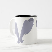 Twee olifantenkoppen komen samen tweekleurige koffiemok (Voorkant links)