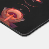 Twee oranje harten in het zwart op aarde bureaumat (Hoek)