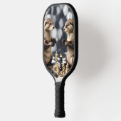 Twee otters die schaken, pickleball paddle (Links)