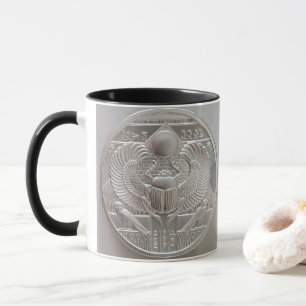 Twee ounce zilveren Ra en Scarab Ronde Mok