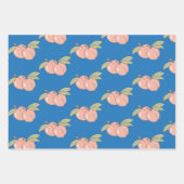 Twee perziken die papierbladen overvullen inpakpapier vel (Voorkant)