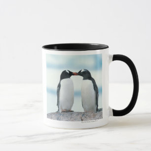 Twee pinguïns die de pieken aanraken mok