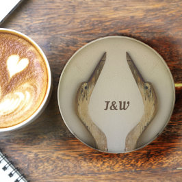 Twee reigers rustieke kust verweerde natuursteen zandsteen onderzetter