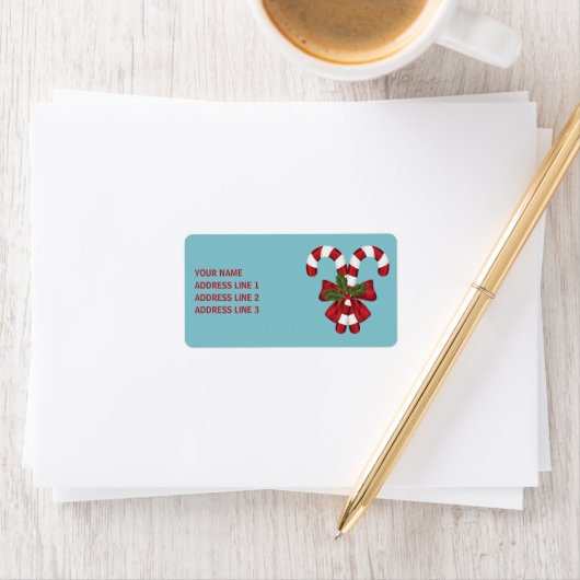 Twee rode en witte snoepjes met tekst etiket (Insitu)