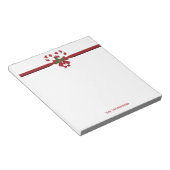 Twee rode en witte snoepjes met tekst notitieblok (Schuin)