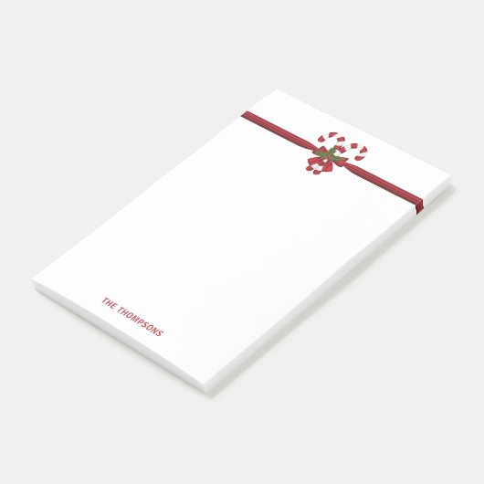 Twee rode en witte snoepjes met tekst post-it® notes (Schuin)