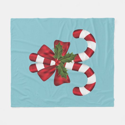 Twee rode en witte snoepjes op blauw fleece deken (Voorkant (Horizontaal))