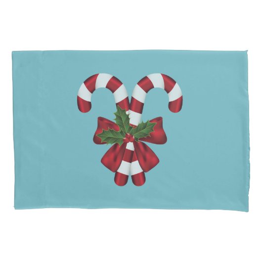 Twee rode en witte snoepjes op blauw kussensloop (Voorkant-Links)