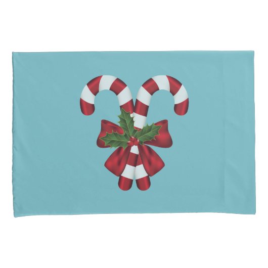 Twee rode en witte snoepjes op blauw kussensloop (Voorkant-Rechts)