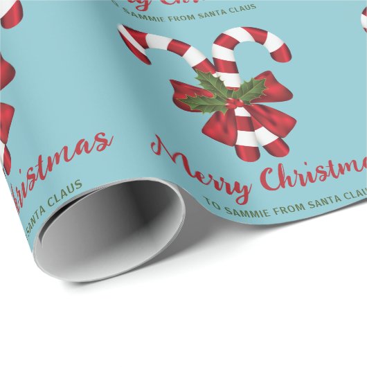 Twee rode en witte snoepjes op blauw met tekst cadeaupapier (Rol Hoek)