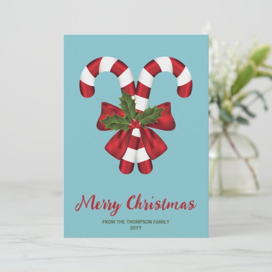 Twee rode en witte snoepjes op blauw met tekst feestdagenkaart (Staand voorkant)