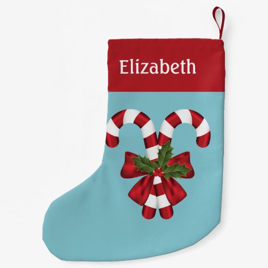 Twee rode en witte snoeprietjes op blauw met naam kleine kerstsok (Achterkant)