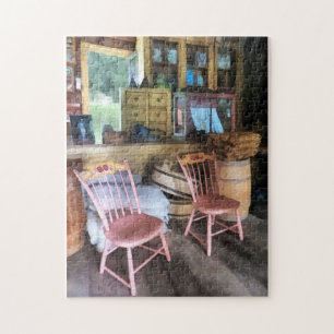 Twee roze stoelen in de algemene winkel legpuzzel