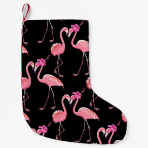 Twee roze vlammen op een zwarte achtergrond. Naadl Kleine Kerstsok