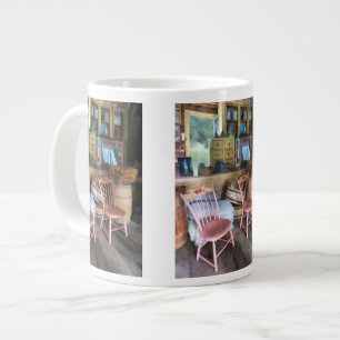 Twee roze voorzitters in het algemeen grote koffiekop