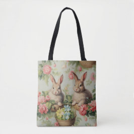 Twee Schattige paashaas zittend tussen de bloemen Tote Bag