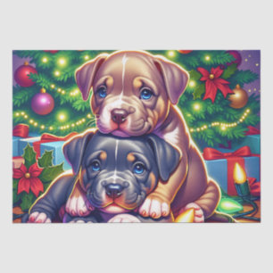 Twee Schattigee Puppies spelen onder de kerstboom Tissuepapier