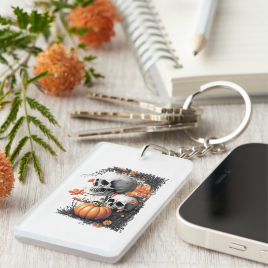 Twee schedels en een pompoen tussen de bloemen. sleutelhanger (Voorkant Rechts)