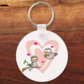 Twee schildpadden door een tak sleutelhanger (Voorkant)