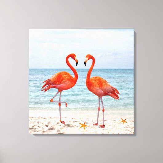 Twee Vibrant Roze Flamingos op het strand Canvas Afdruk (Voorkant)